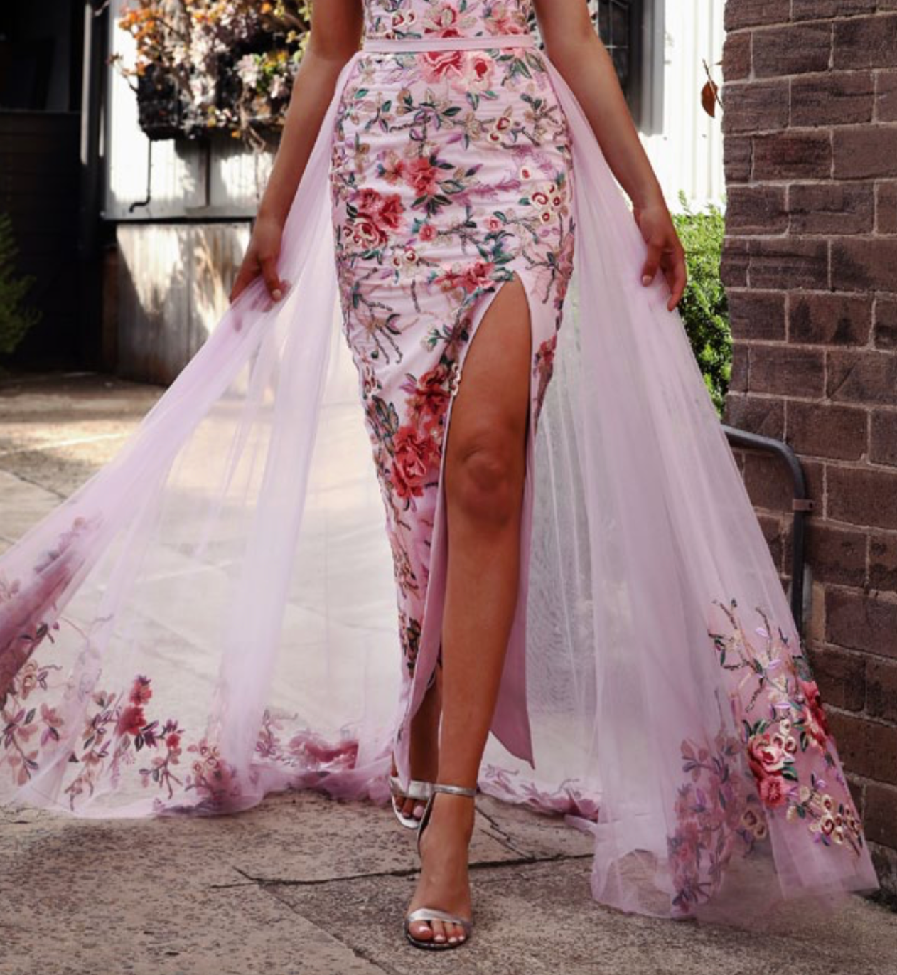 Ball gown wedding dress with floral lace skirt and atlas top